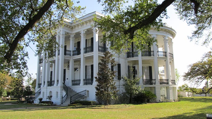 Exterior photos of Nottoway Plantation showing a 2-story white Southern Plantation house with trees in the foreground.