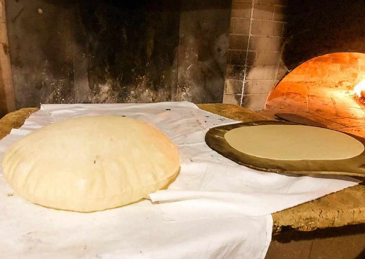 baking pane carasau in wood burning oven