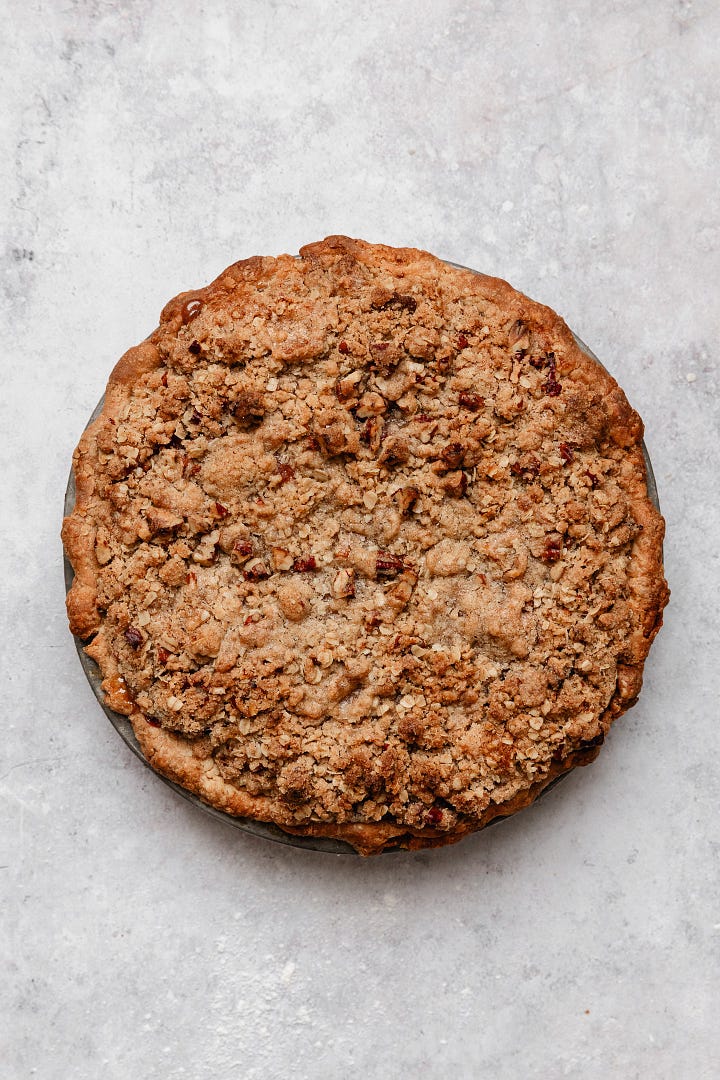 Process shots making bourbon peach crumb pie with vegan flaky pie crust and brown sugar oat crumb