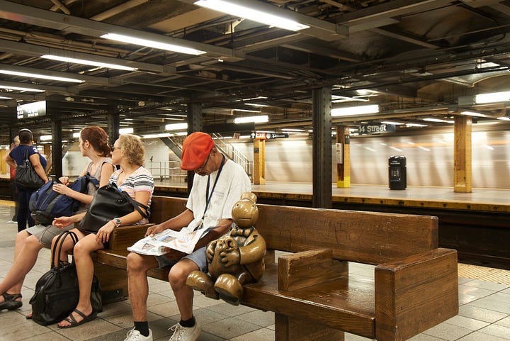 4 photos of "Life Underground" in the NYC subway, by Tom Otterness