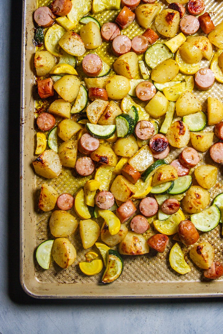 sheet pan Greek potatoes with chicken sausage and zucchini