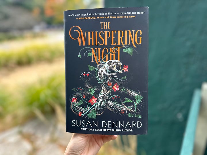 Images of the US edition of The Whispering Night, one showing Susan holding it and smiling. A mother showing it lying on a wooden background. Another showing the hardcover stamp of the Luminaries moon in copper. And a final image of the Whispering Night with beach grass and a green wall behind it.