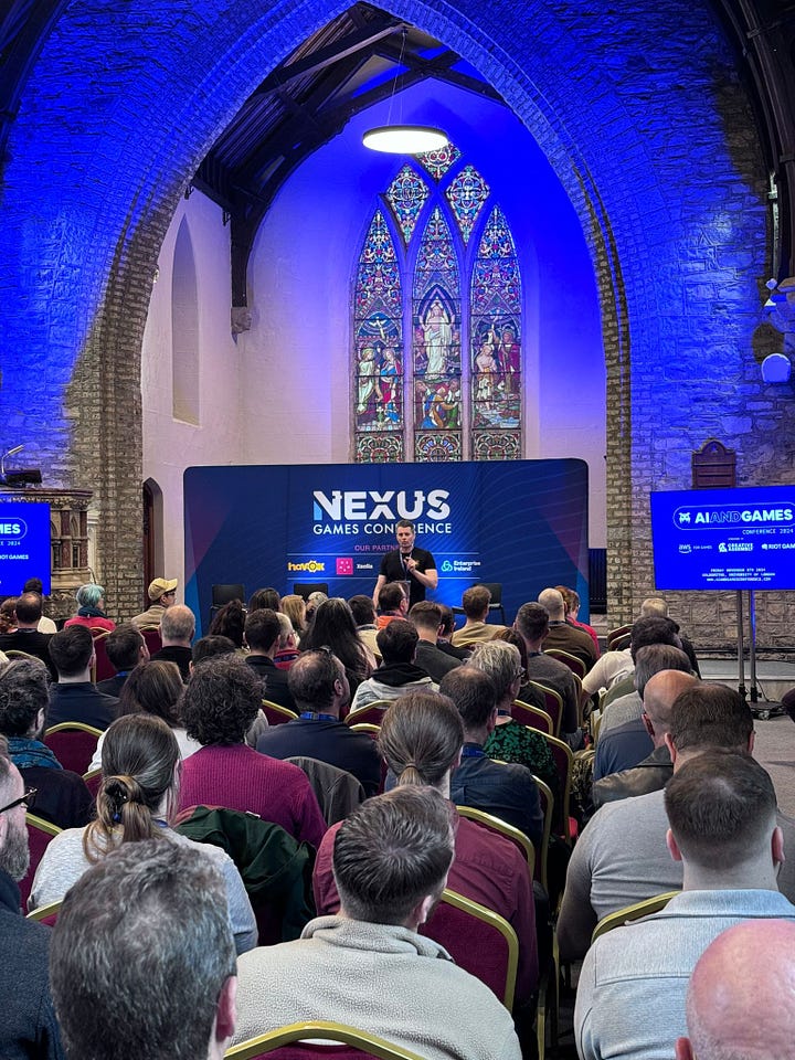 Me hosting the AI for games roundtable, and the second of me delivering a talk to a crowd of over 150 people. in a church.