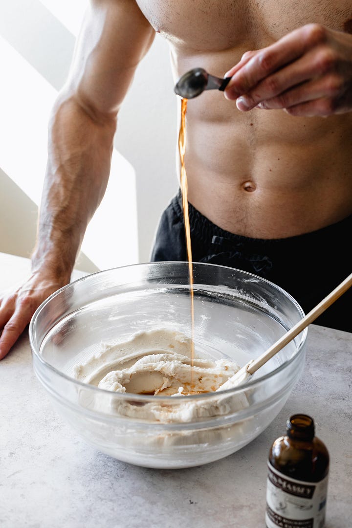Shirtless man in black pants making vegan American buttercream step by step