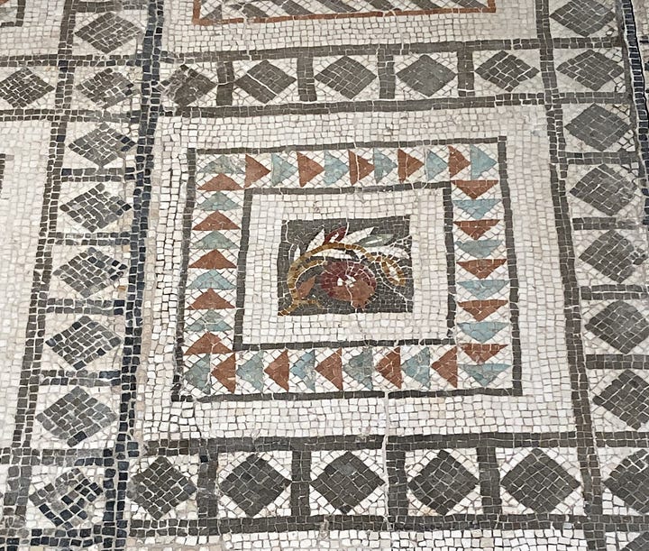 Two images of Roman mosaics, the first a close up of the pomegranate, the second showing the pomegranate and other parts of the mosaic