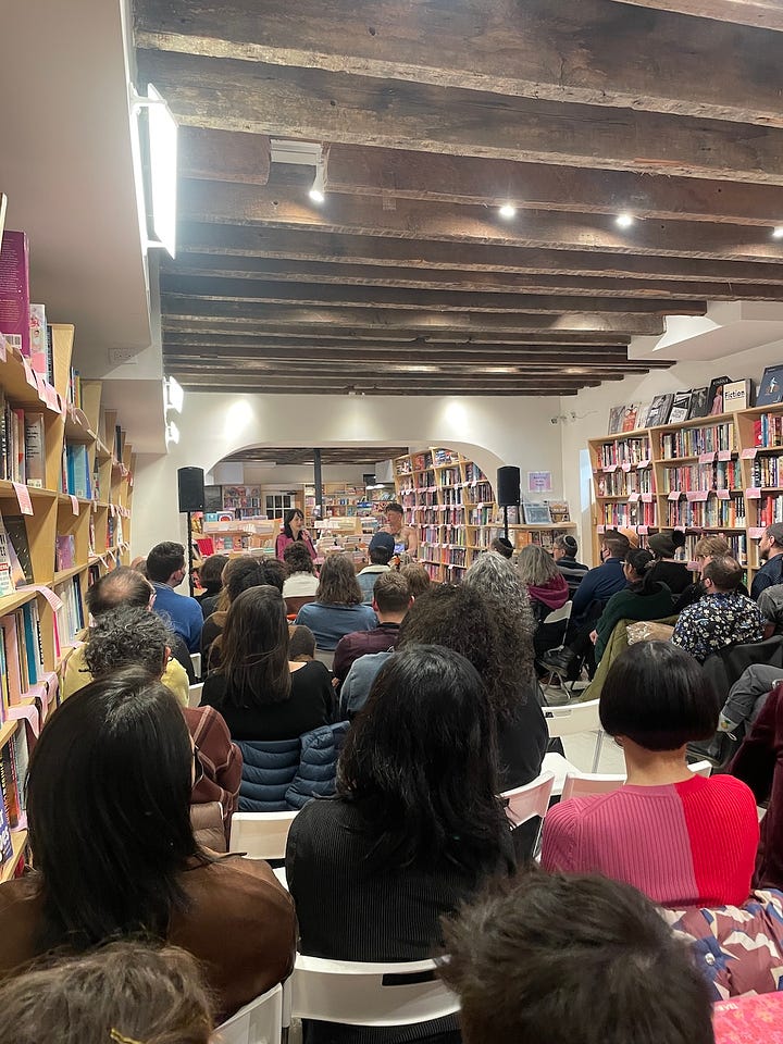 Two book launches in the same bookstore, both crowded