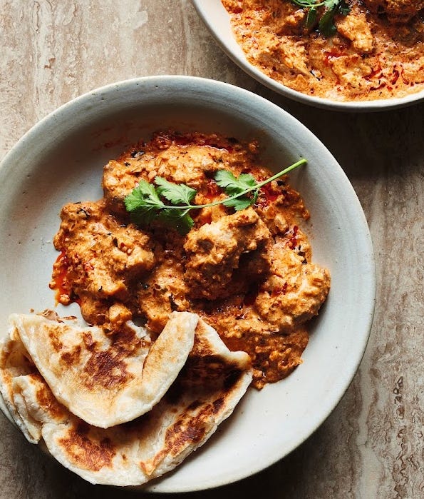 Left photo is a bowl with a chicken masala next to a folded naan bread. On the right we have three bowls with sorbet. Two of the bowls are only half in the photo. The center one is a beautiful red fuschia.