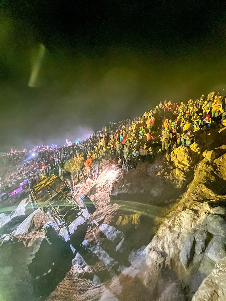 Off-roading takes over the Chocolate Thunder pass at night during King of the Hammers festivities in Johnson Valley, California.