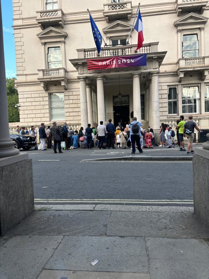 About 50 Catholics gather to say a rosary of reparation outside the French Consulate for the Paris blasphemies.