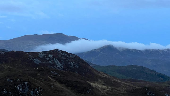 A few photographs from the the top of Ben A’an. The large loch is Loch Katrine and the smaller one behind the tent is Loch Achray.