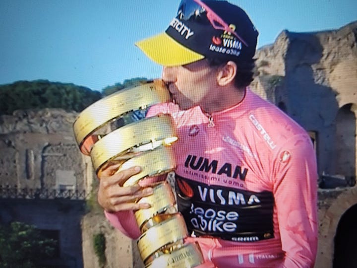 Yates, Del Toro and Carapaz on the podium, and Yates with the Giro trophy