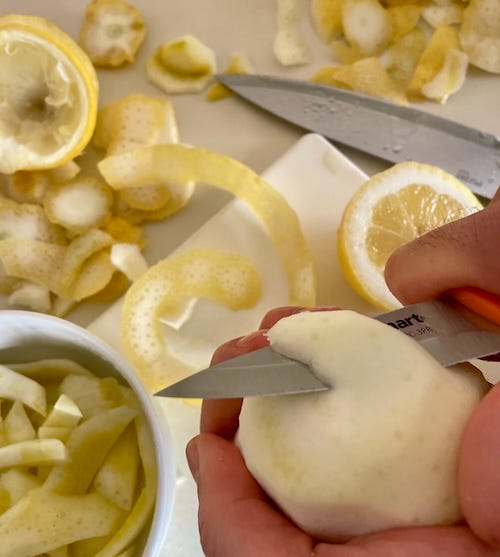Four photos of step by step of lemon peels being prepared by separating zest from pith, slicing and placing in plastic bags to travel.