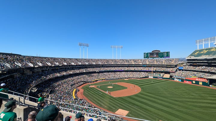 Fans crowd BART, the pedestrian walk way, and the Coliseum itself