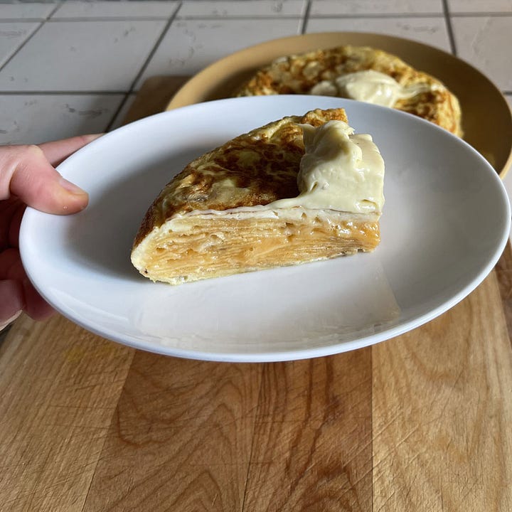 Bluebird crisps, spanish omelette, aioli, partly eaten omelette.