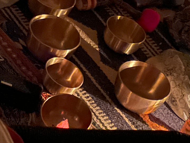 Shamanic sound bath with singing bowls, gong, chimes and more by fire and shrine