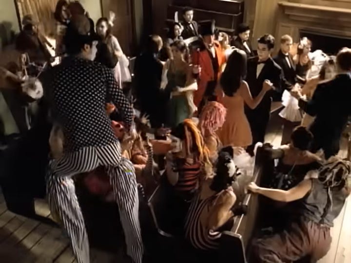 scenes from the music videos of "Mr. Brightside" and "I Write Sins Not Tragedies". Both are wide shots of multiple people dressed in an over-the-top manner in eccentric and ethereal garments reminiscent of circuses, the Victorian era, and the medieval era.