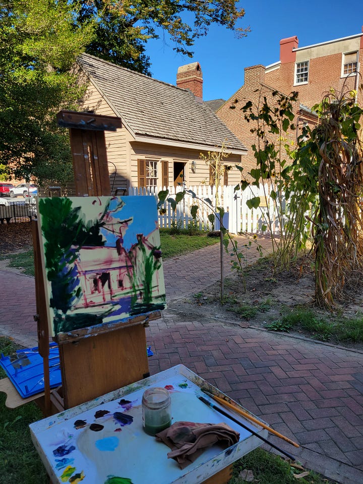 landscape paintings in progress and the final set up at the Biggs Museum
