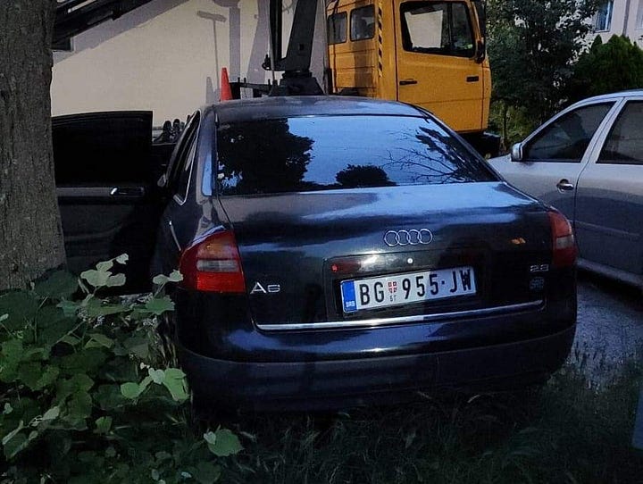 Revealing Clues: First Image Captures Belgrade-Plated Vehicle, Second Image Exposes Its Intriguing Trunk Contents.