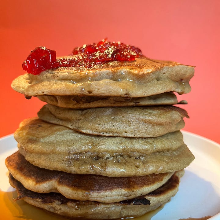 Rye pancakes with fruit and maple syrup