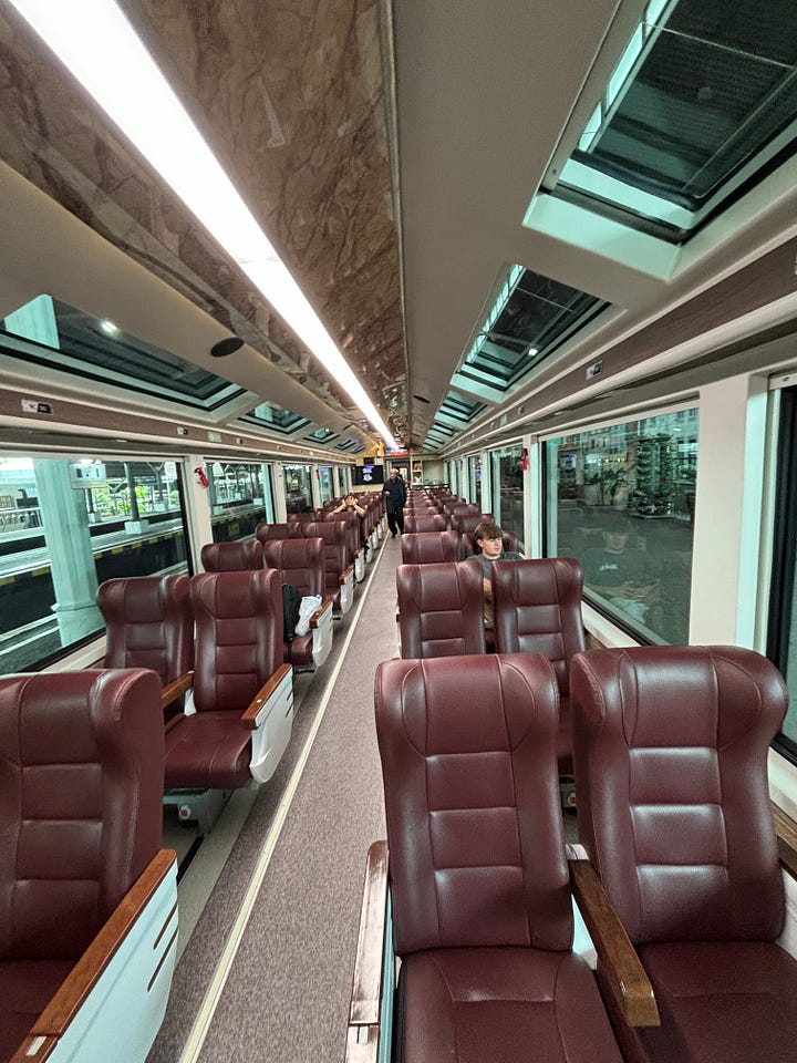 Panoramic class on the train from Yogyakarta to Surabaya in Indonesia