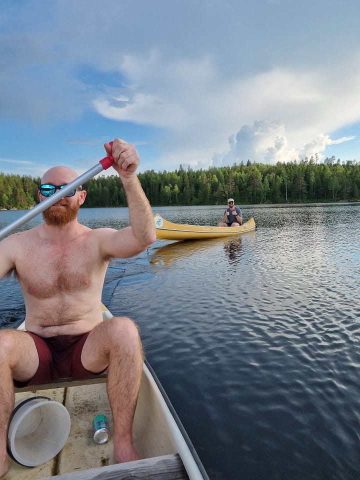 Photo 1: Aisling walking away from the camera with tall trees on both sides. Photo 2: Dave and Louis at the peak of the hike. Photo 3: view of canoes on a lake. Photo 4: Dave paddelling while Louis gives a thumbs up from another canoe connected by rope.