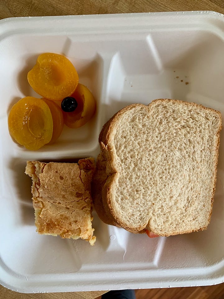 various meals, including pimento cheese with soup, baby carrots, ranch strawberry shortcake; sandwiches, fruit, and a pot pie in a bowl