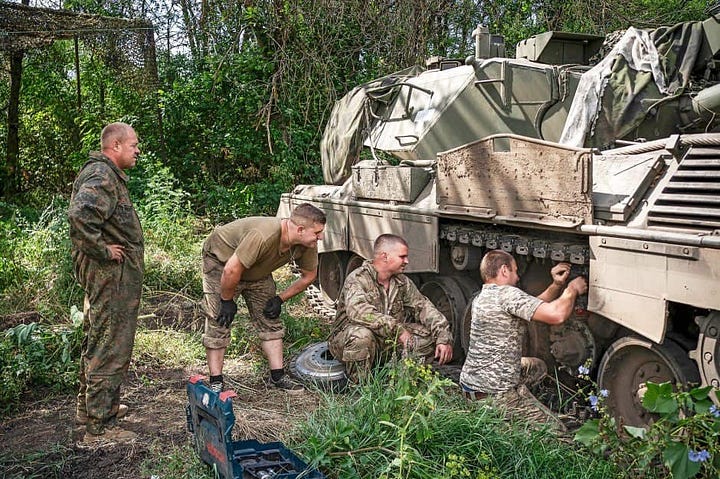 At left, a Leopard 1A5 at Rheinmetall's Ukraine facility. At right, the 44th Mechanized Brigade conducts field repairs on a Leopard 1A5. Via social media