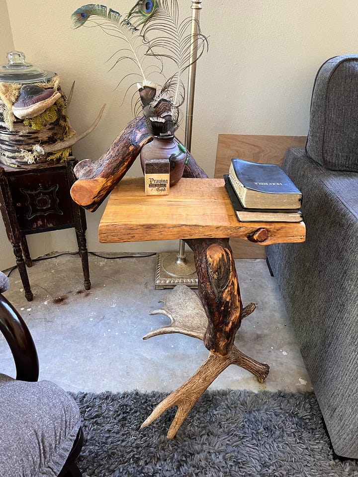 tables made of wood and deer antlers