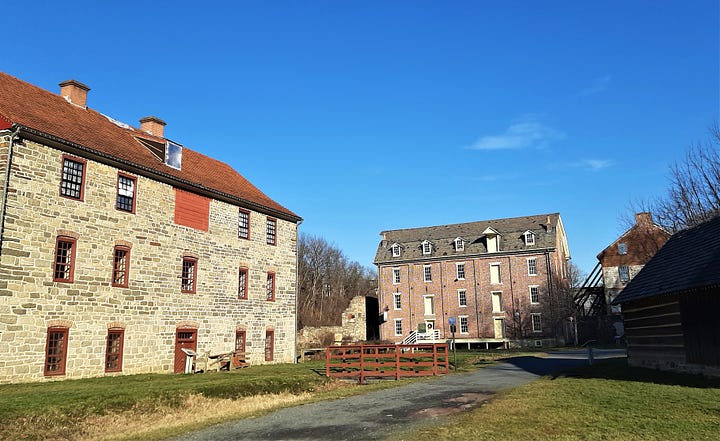 Old stone buildings, including a blacksmith shop, stand in Bethlehem PA.