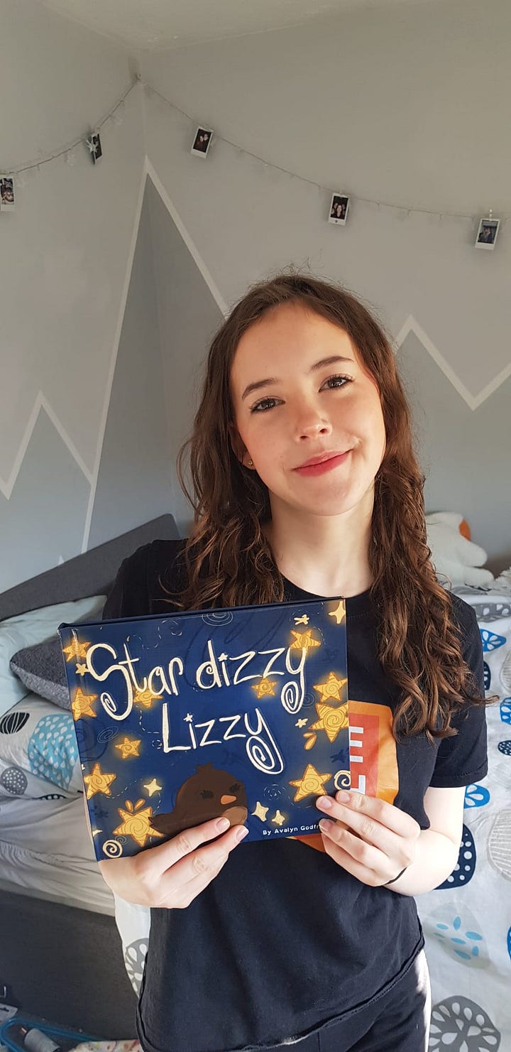 Avalyn with children's book and in hospital for treatment