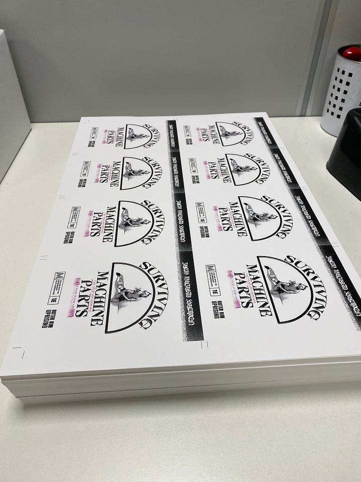 Maps and covers at the printer's facility