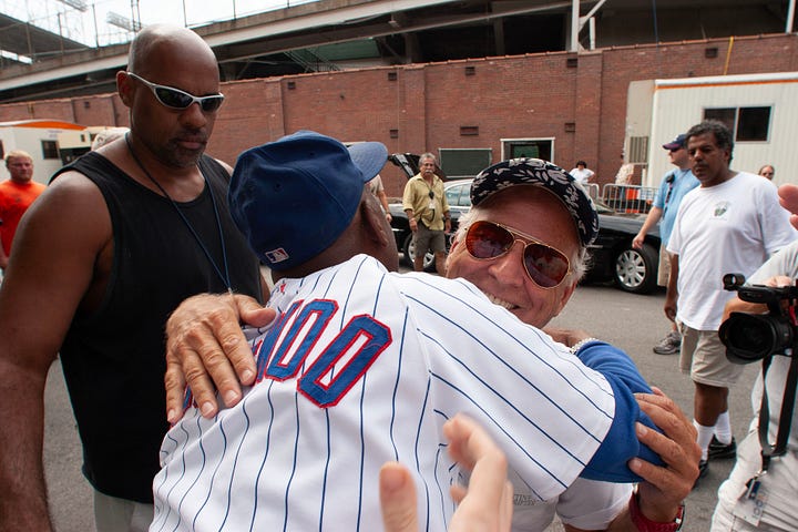 Jimmy Buffett meets Cubs super fan, Ronnie Woo Woo outside Wrigley Field, 2005. Photo: matt carmichael/rocknroll.net