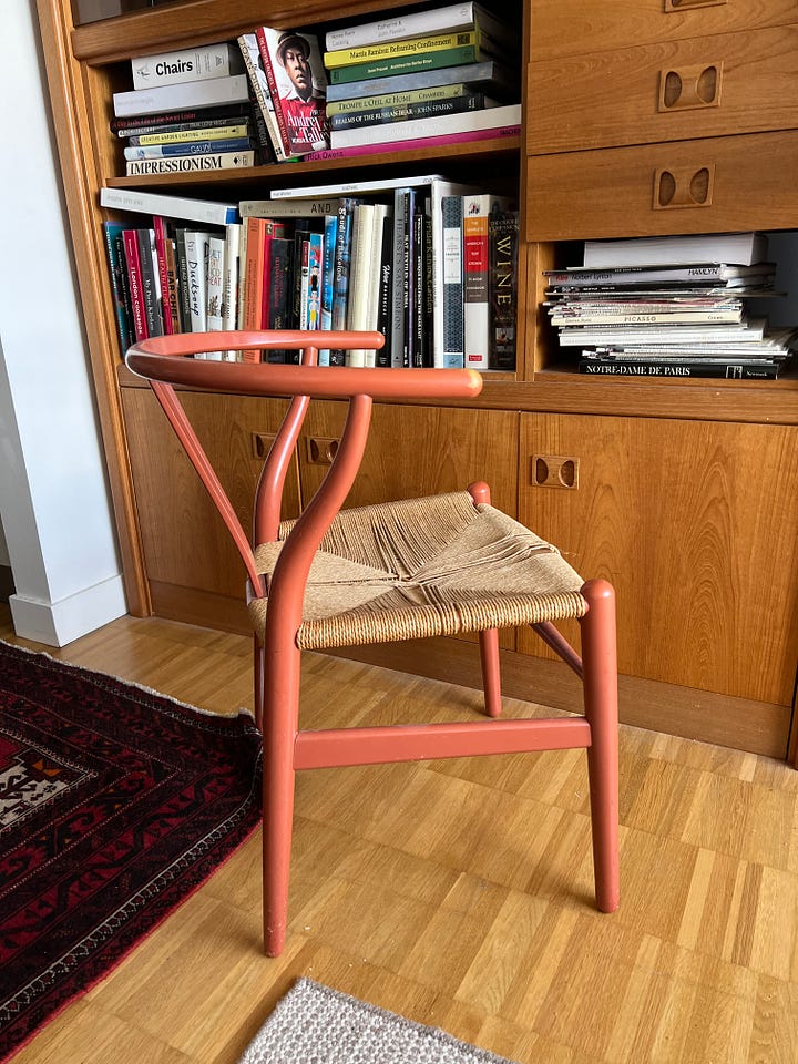 My wishbone chair. It's a beautiful terracotta colour that has developed a great patina over time. 