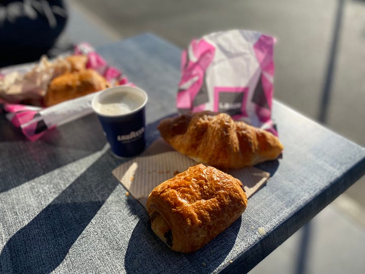 A bakery with croissants, coffee, pastries and chocolates