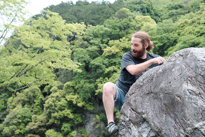 Matt Ketchum climbing boulders at Mitake, Tokyo, Japan.