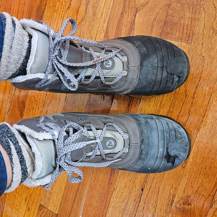 Old shoes with crack in toe 