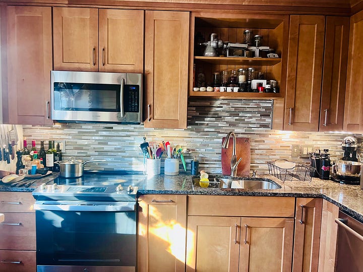 Kitchen with wooden cupboards. 