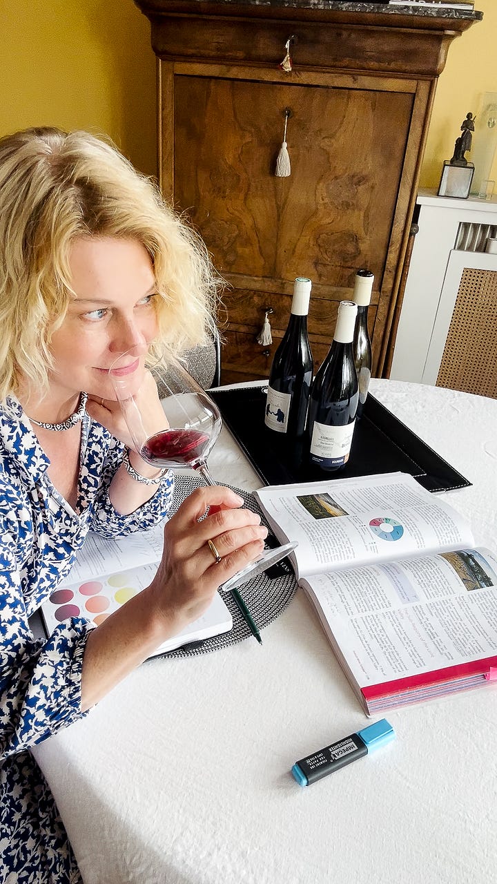 Karen Bussen tastes wine and studies for a wine exam