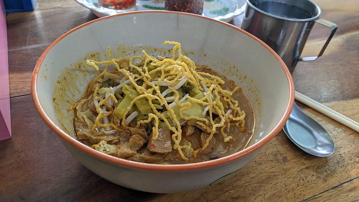 [clockwise from L to R] 1) the cold yet tasty bowl at Ming Kwan - Suthep 2) lovely bowl at Garden to Table, where my sister proclaimed her beef KS the "best yet" 3) Ming Kwan - Old City, a habit 4) my sister's bowl at Khao Soi Manee 2 (I think)