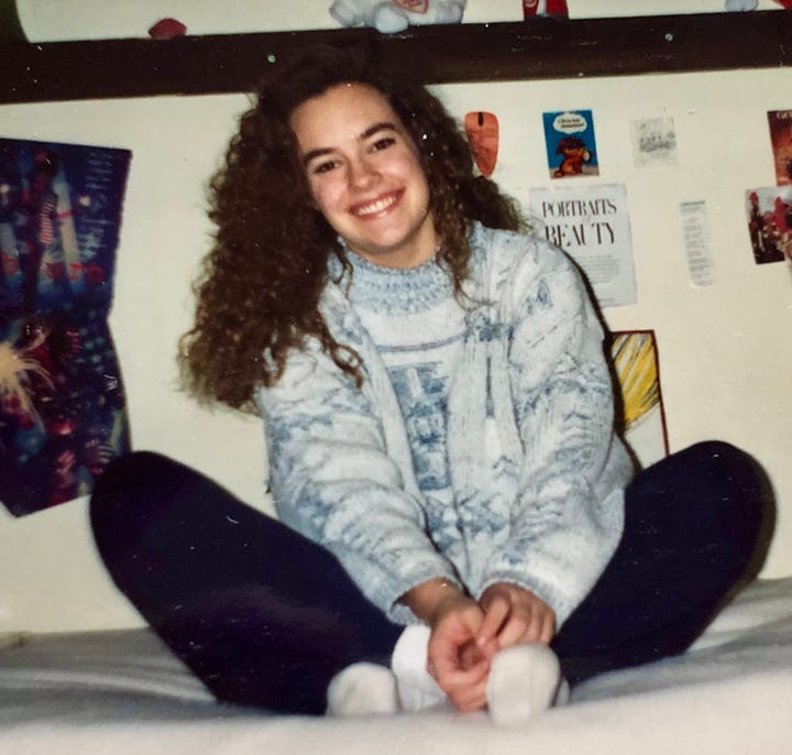 Flashing "tah-dah!" in rainbow tie-dye, being a ham with a rose in my mouth, blubbering in my graduation cap and gown, and sitting on my bed with a huge smile.