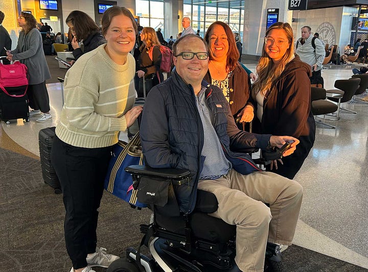 John pictured with attendees of the Travel Ability Summit in San Francisco.