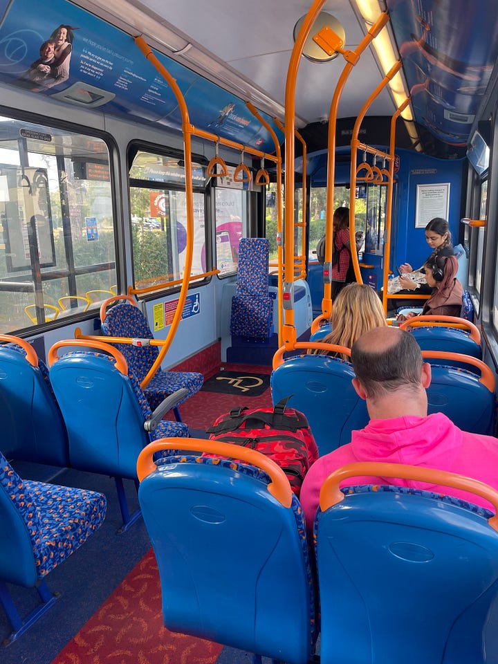 Two of the images show buses, one is blue with white stripes and the other is red. Two pictures show people sat on each bus