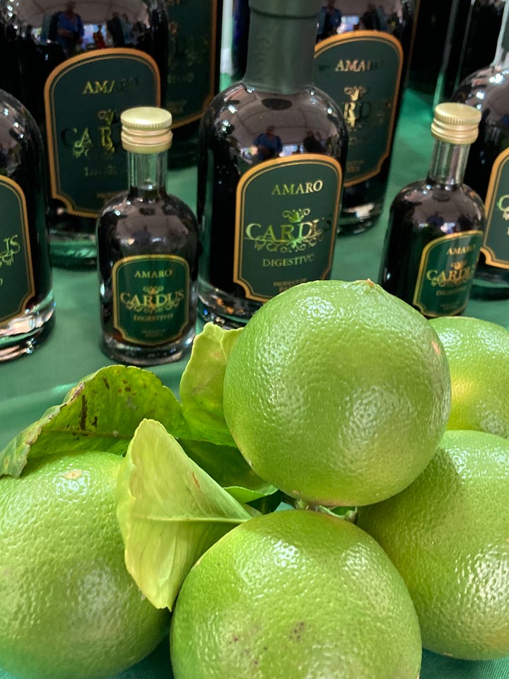 Two images of citrus and citrus-based products from Terra Madre, including bergamot (right) and a jar of orange curd from Spain..