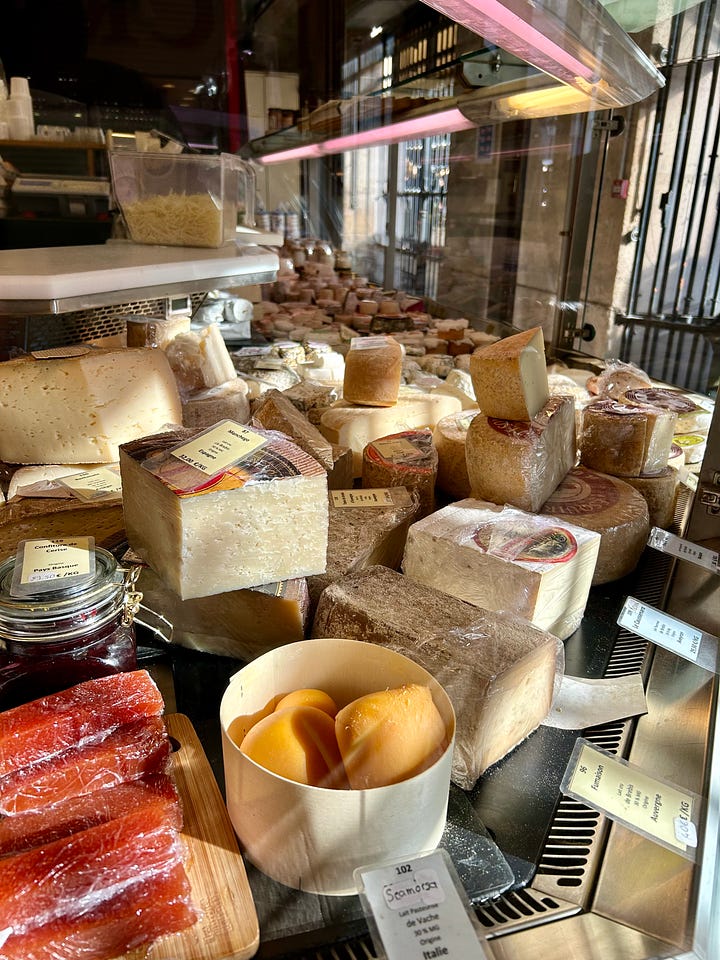 market stands of cheese and vegetables in France