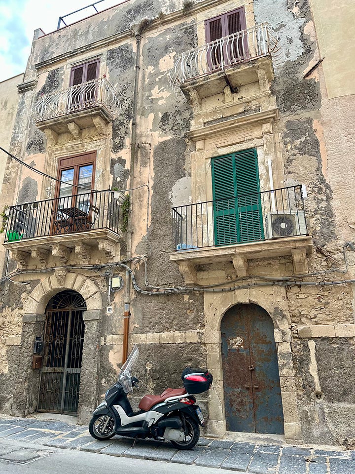 Images show street scenes from Sicily