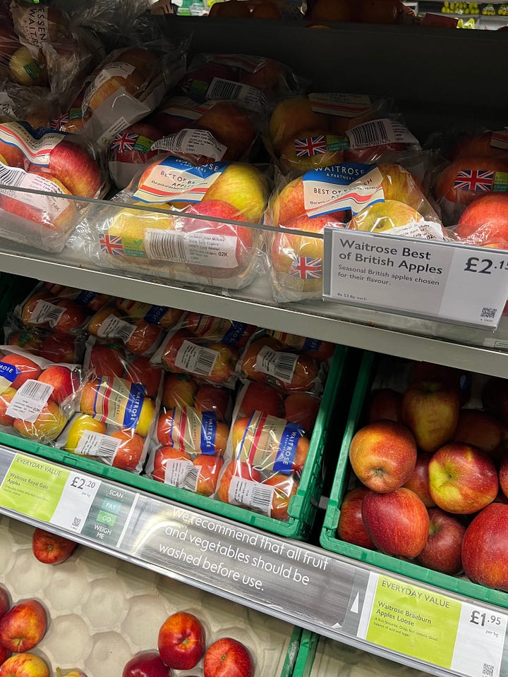 1. A local generously allowed us to glean from his apple tree; 2. Bags of delightful cox-like apples; 3. Using the small table press on the collected apples the very same day; 4. Waitrose advertising 'Best of British Apples' but one shelf has apples from New Zealand, another France, and another Chile.