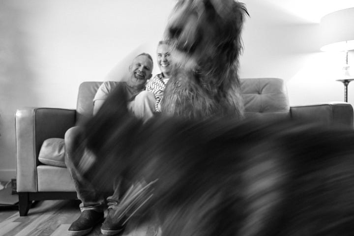 Husband Brad and I create some New years chaos and photos with the dogs in our living room.