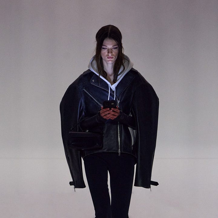 grey hoodie under coat