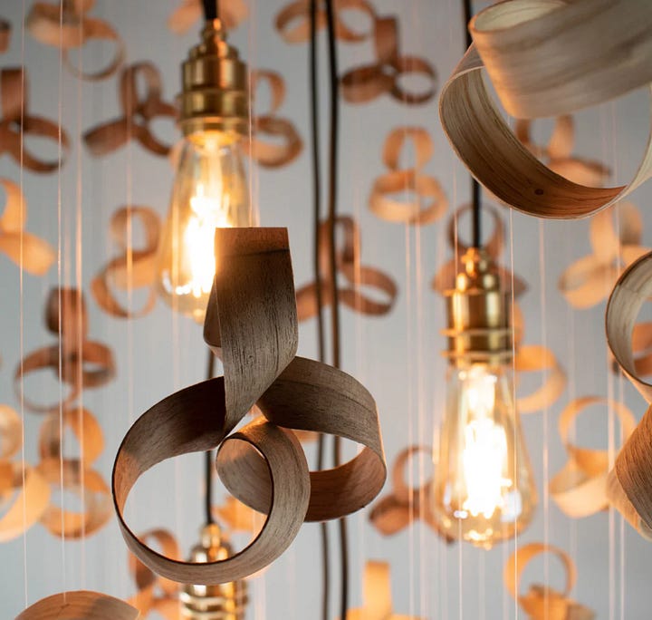 individual curved pieces of wood to create the most impressive chandelier