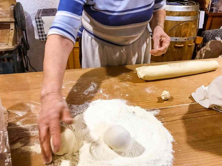 rolling dough balls for pane carasau